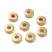 Synteettinen helmi kaksoisrondelli kullanvärinen 6x2,5 mm 25 kpl