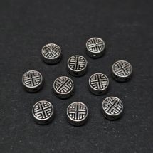 Metallihelmi antiikkihopeanvärinen litteä pieni kuvioitu pastillihelmi 6,5x3,5 mm 10 kpl